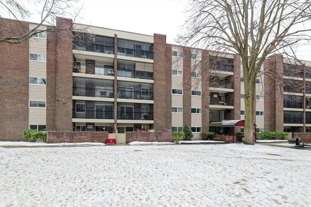a front view of a building with street view