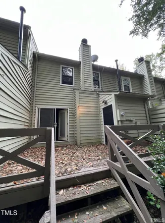 a front view of a house with street