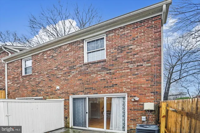 a brick building with a large window