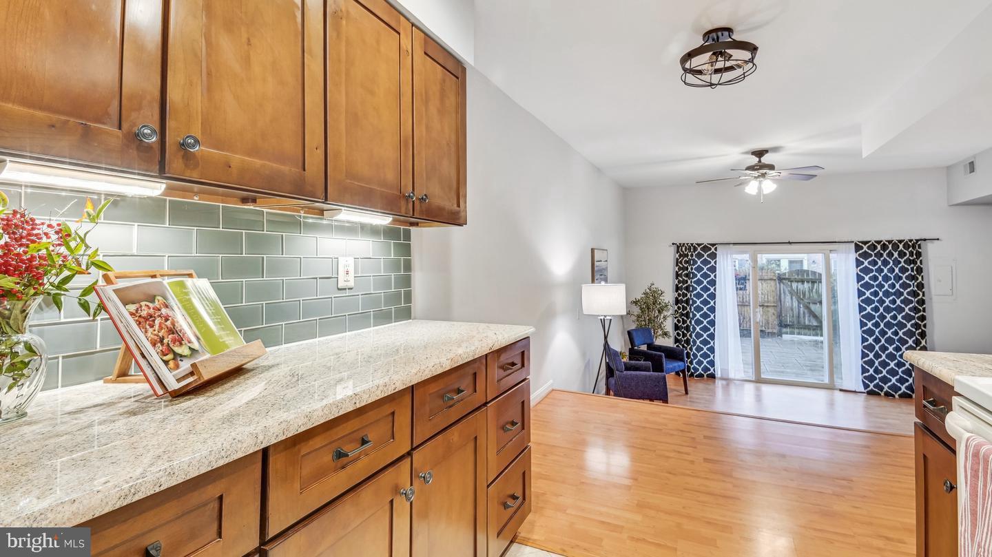 8352 Forrester Boulevard, Unit 456 Springfield, VA 22152 - Photo 4 of 18 a kitchen with a sink and cabinets