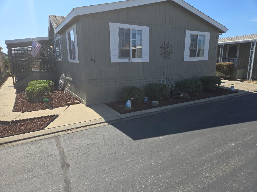 1400 North Tully Road, Unit 141 Turlock, CA 95380 - Photo 1 of 1 a house view with a outdoor space