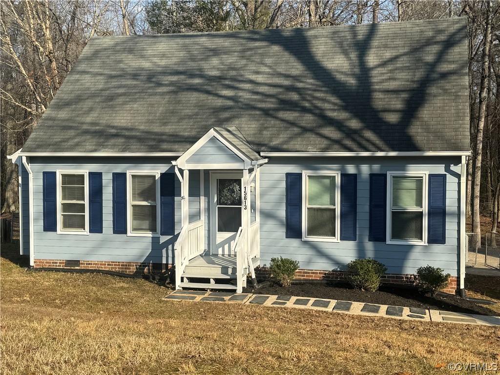 15613 Roland View Drive Chester, VA 23831 - Photo 1 of 18 a front view of a house with a yard