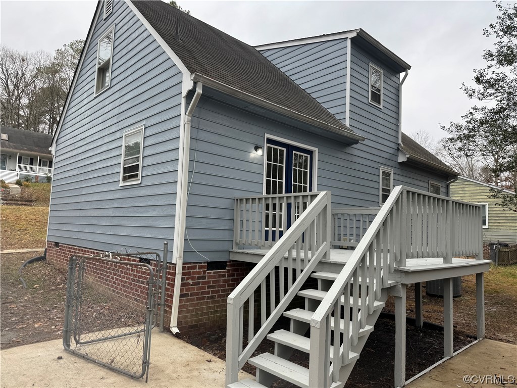 15613 Roland View Drive Chester, VA 23831 - Photo 15 of 18 a view of house with wooden stairs and stairs