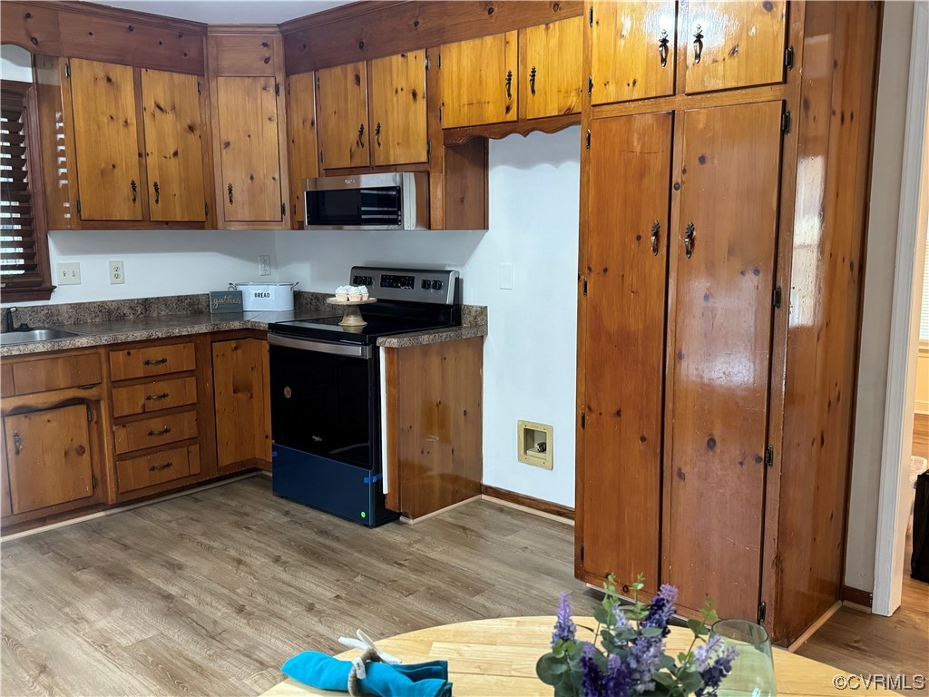 15613 Roland View Drive Chester, VA 23831 - Photo 6 of 18 a kitchen with stainless steel appliances granite countertop a refrigerator and a stove