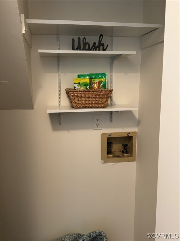 15613 Roland View Drive Chester, VA 23831 - Photo 8 of 18 a shelf with books and knick knacks on it