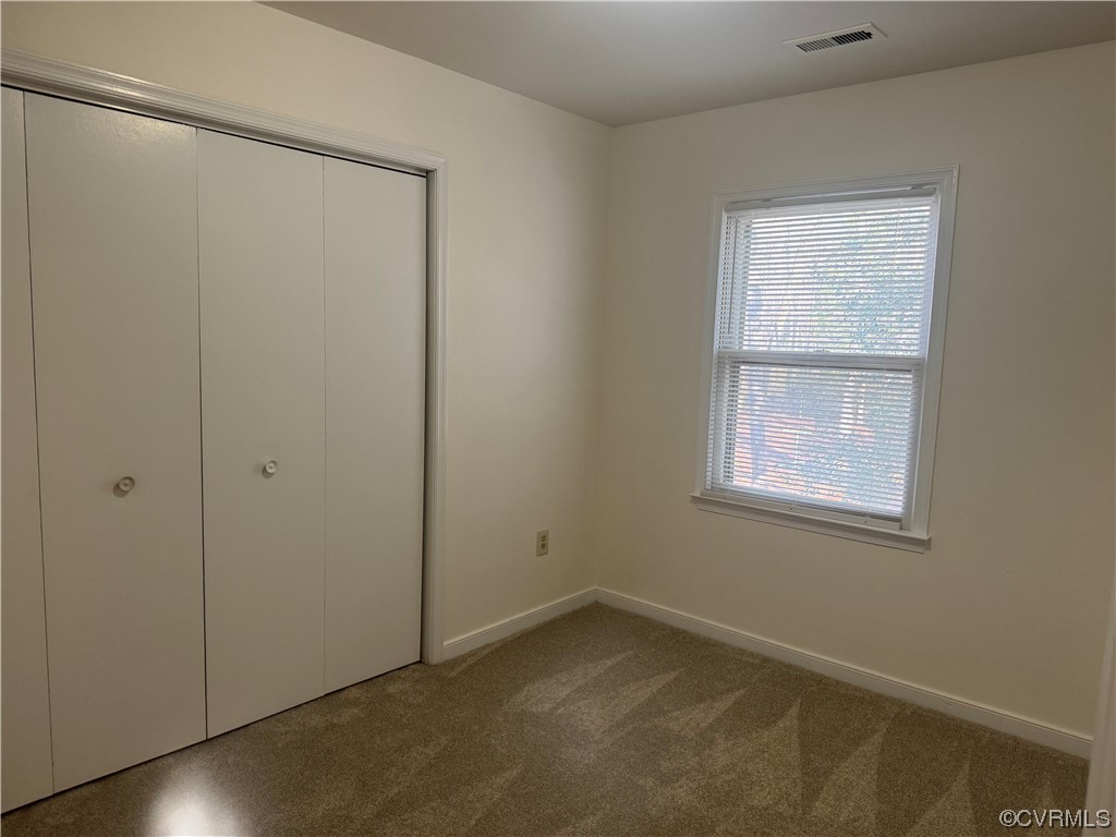 15613 Roland View Drive Chester, VA 23831 - Photo 10 of 18 a view of an empty room with a window