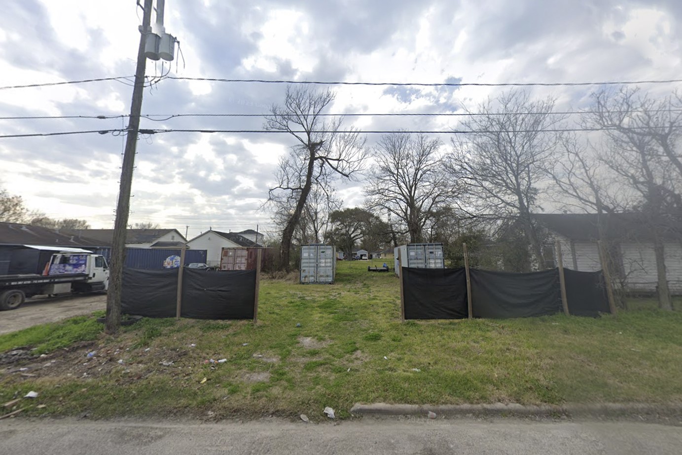 0 Maury Street Houston, TX 77009 - Photo 2 of 5 a view of a backyard with couches chair and wooden fence