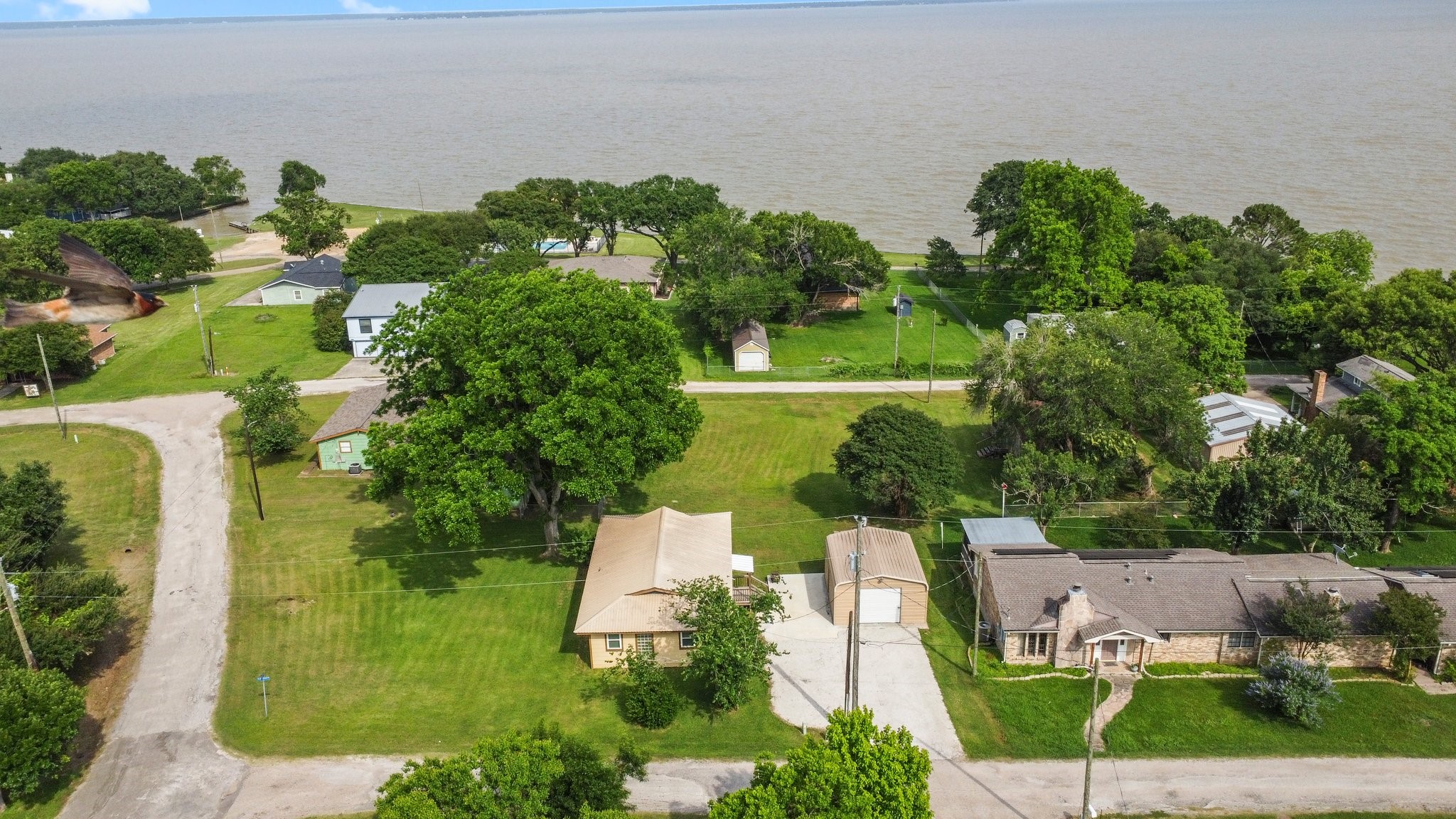 21 Clearview Point Blank, TX 77364 - Photo 38 of 43 an aerial view of a house with a yard basket ball court and outdoor seating