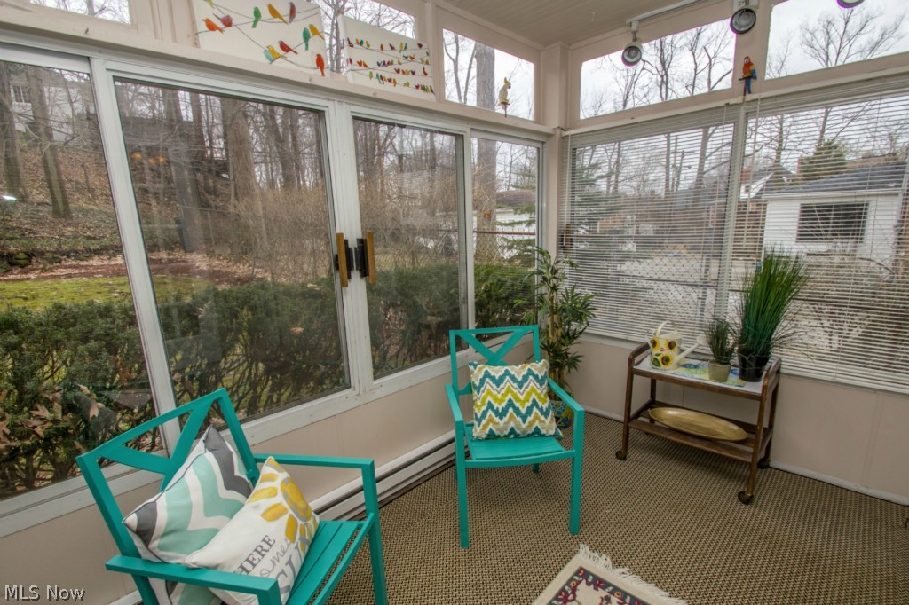 3570 Woodridge Road Cleveland Heights, OH 44121 - Photo 5 of 24 Sun room glassed in on all sides and heated.