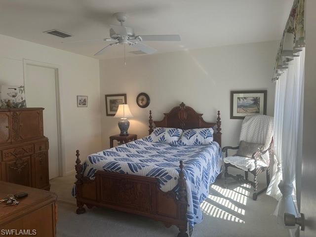1261 Pine Ridge Road Naples, FL 34108 - Photo 6 of 13 Carpeted bedroom featuring ceiling fan