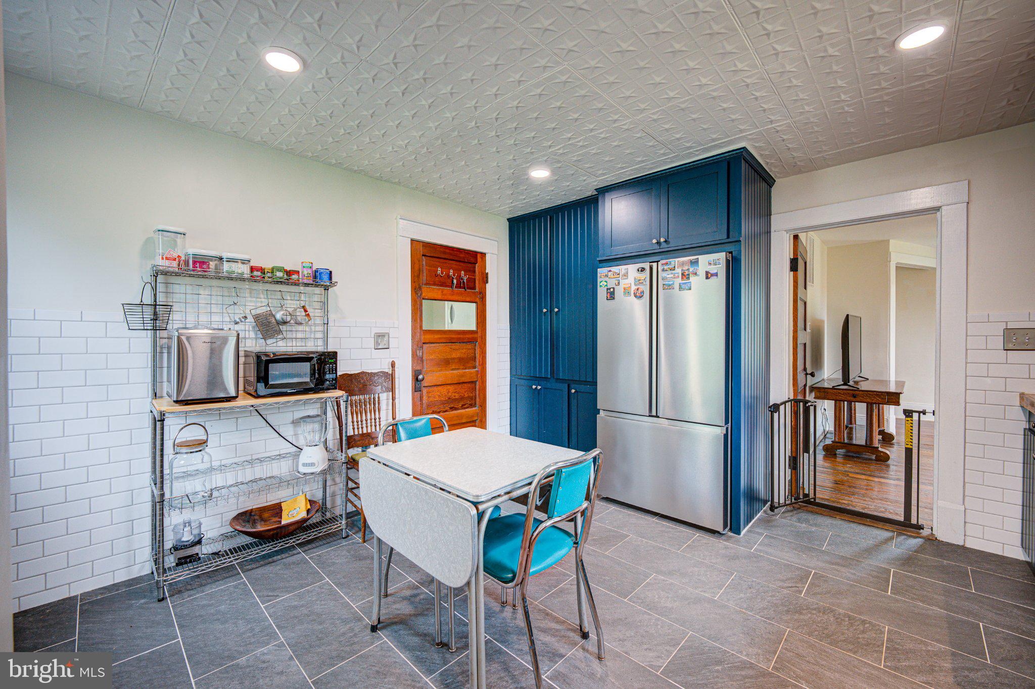 24177 Rapidan Road Mitchells, VA 22729 - Photo 7 of 43 Charming kitchen with modern flair.
