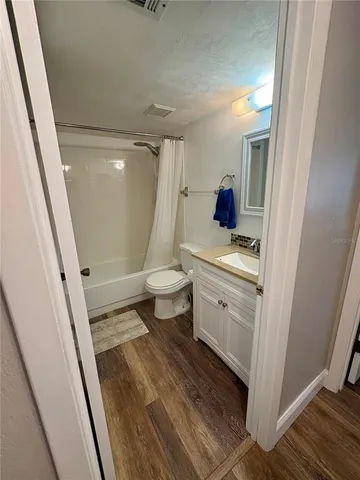 a workspace with furniture and window