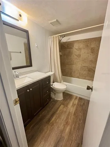 a view of swimming pool from a balcony