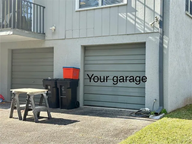 a view of a house with a snow in the yard