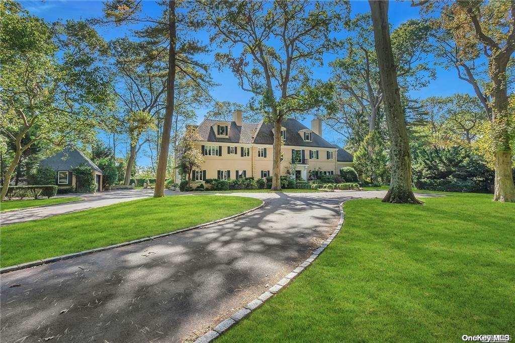 28 Barkers Point Road Sands Point, NY 11050 - Photo 1 of 1 a view of house with yard and green space