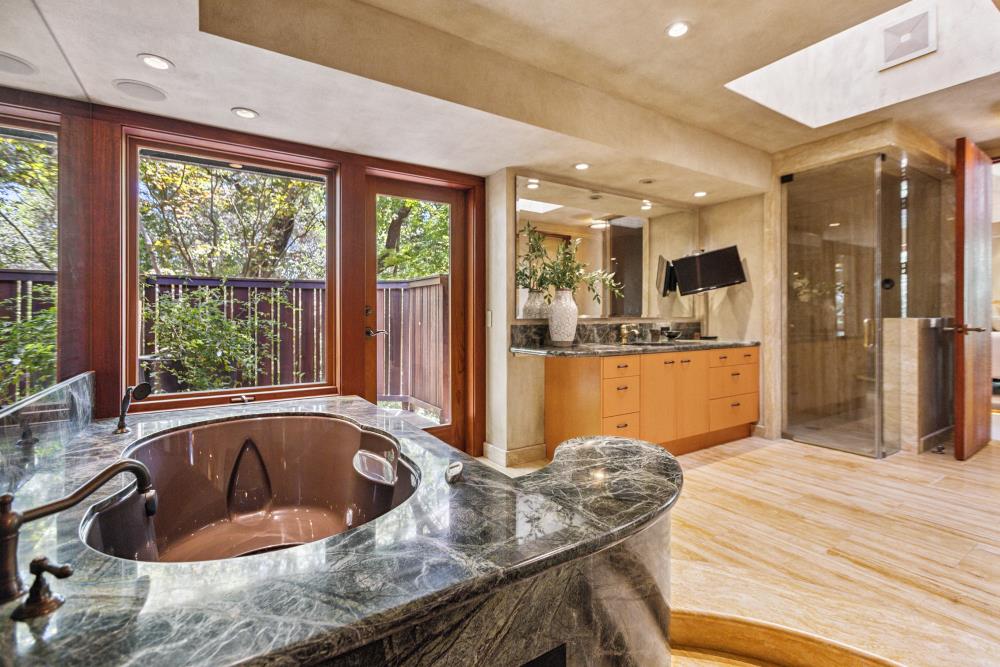 5312 Retreat Way Carmichael, CA 95608 - Photo 36 of 92 a bath tub sitting in a bathroom next to a window