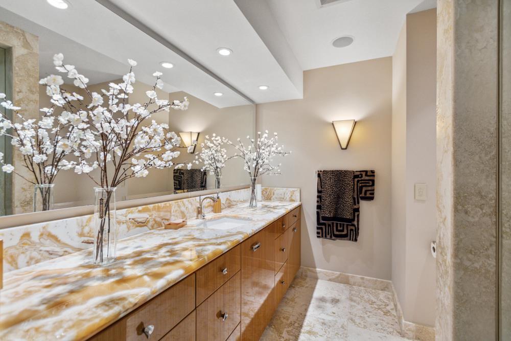 5312 Retreat Way Carmichael, CA 95608 - Photo 45 of 92 a bathroom with a double vanity sink and a mirror