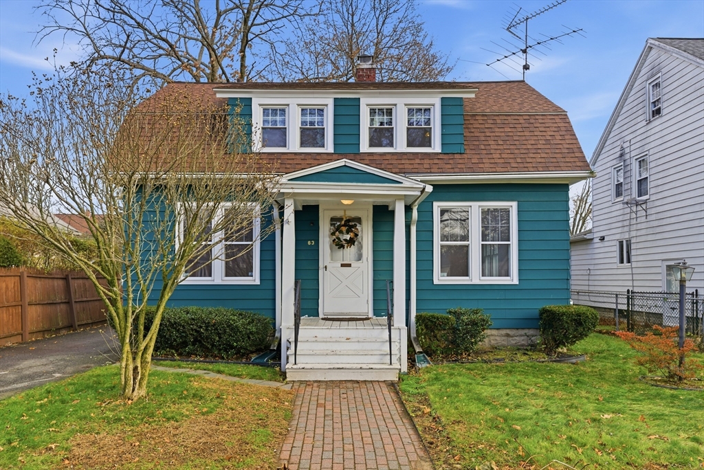 63 Webber Street Springfield, MA 01108 - Photo 1 of 40 a front view of a house with a yard