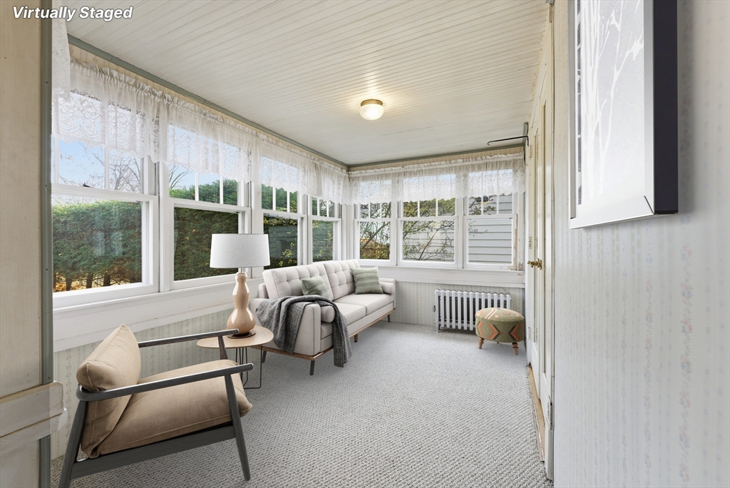 63 Webber Street Springfield, MA 01108 - Photo 16 of 40 a bedroom with furniture and a large window