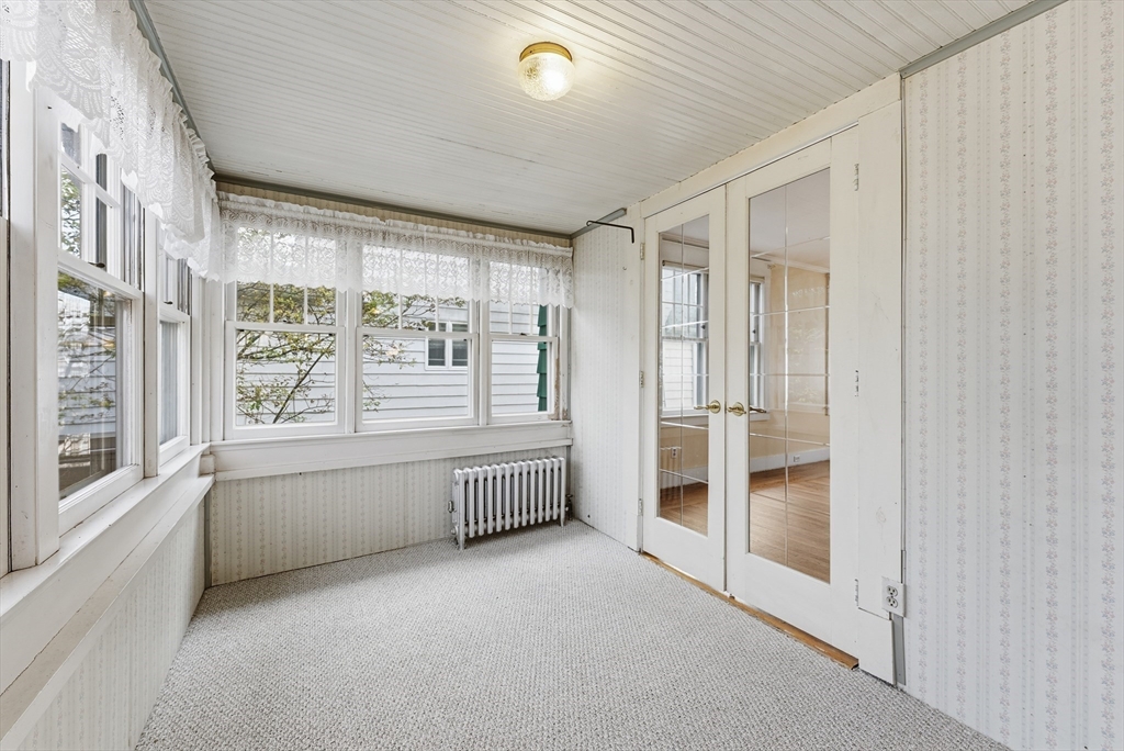 63 Webber Street Springfield, MA 01108 - Photo 17 of 40 a view of an empty room with a window