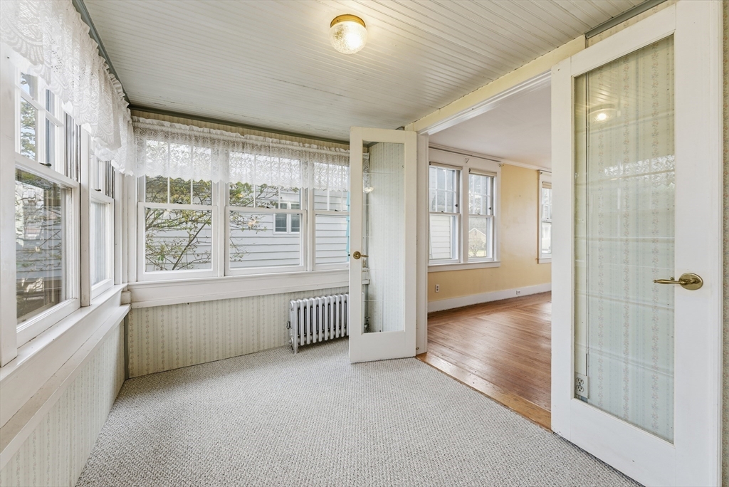 63 Webber Street Springfield, MA 01108 - Photo 20 of 40 a view of an empty room with a window