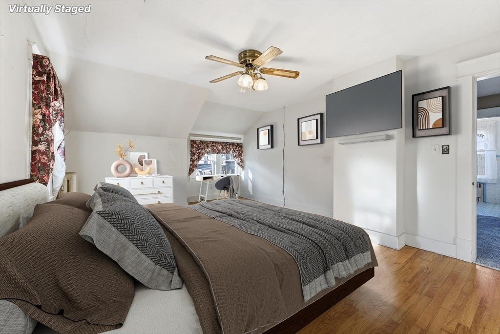 63 Webber Street Springfield, MA 01108 - Photo 27 of 40 a bedroom with a bed and a window