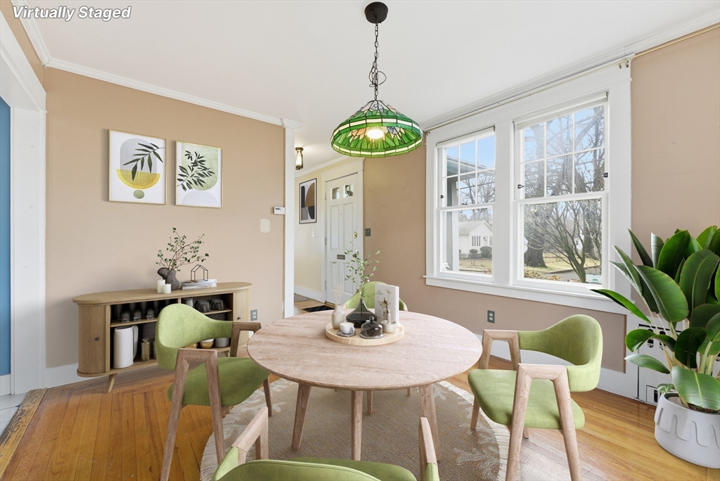 63 Webber Street Springfield, MA 01108 - Photo 6 of 40 a view of a dining room with furniture window and wooden floor