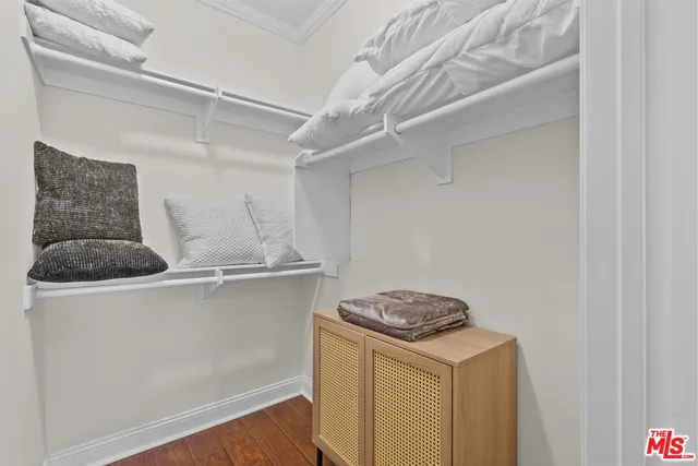 a kitchen with a stove and a refrigerator