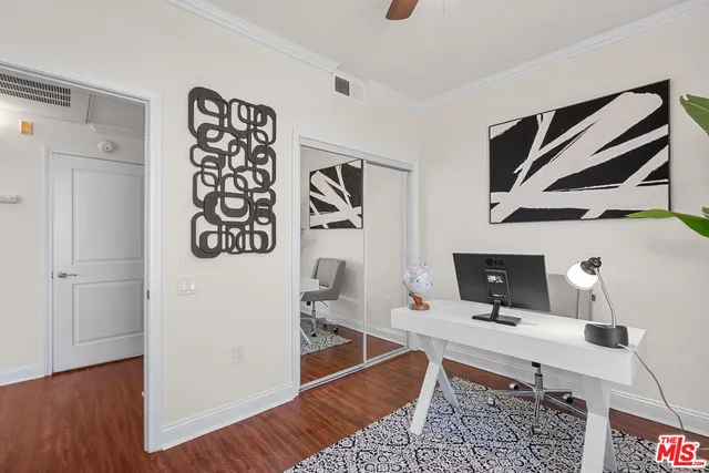 a room with furniture and wooden floor