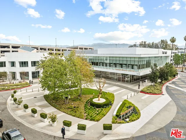 a view of a city with tall buildings