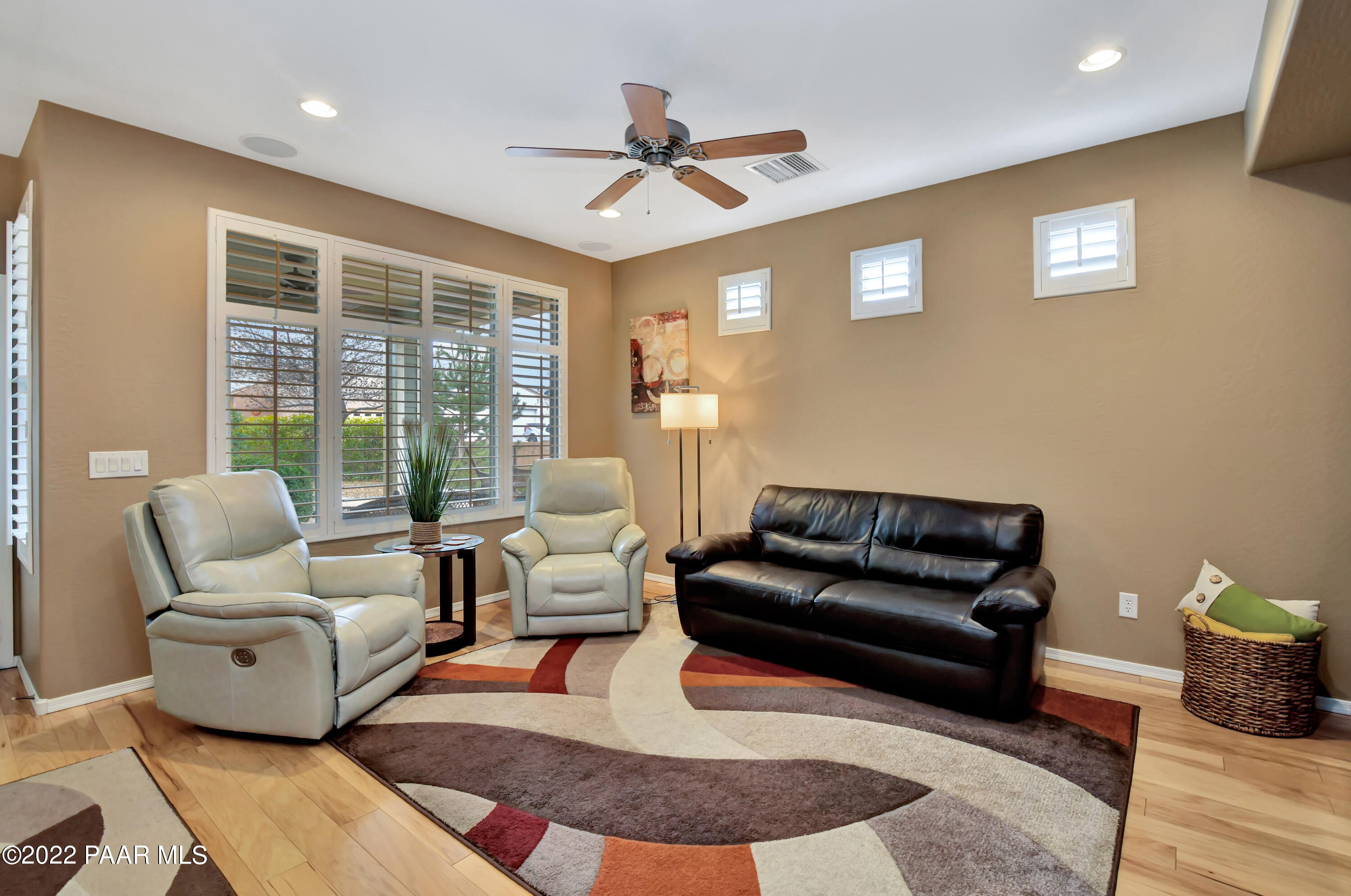 7209 Woolsey Ranch Road Prescott Valley, AZ 86314 - Photo 11 of 49 a living room with furniture and a large window