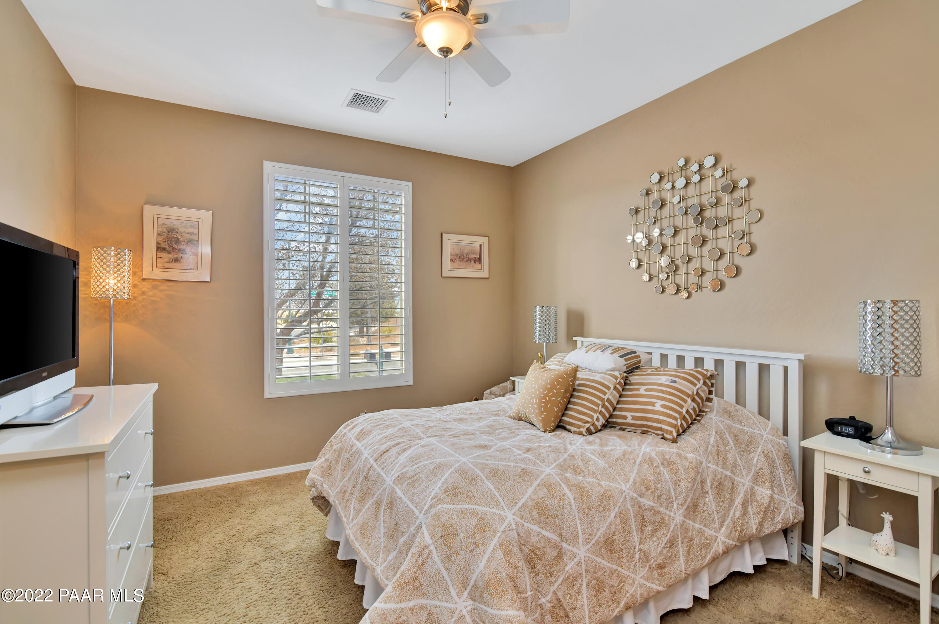 7209 Woolsey Ranch Road Prescott Valley, AZ 86314 - Photo 20 of 49 a bedroom with a bed and a tv