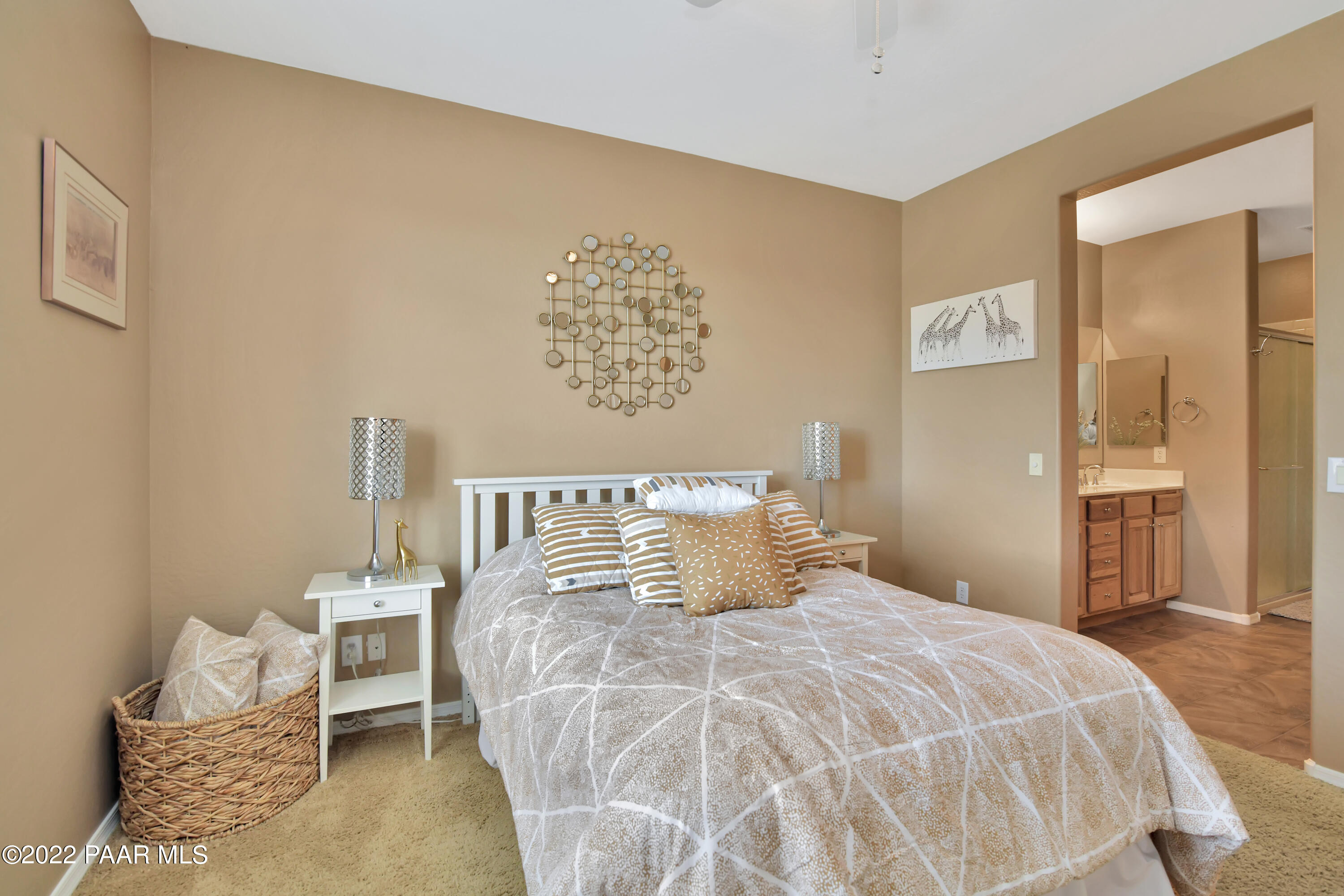 7209 Woolsey Ranch Road Prescott Valley, AZ 86314 - Photo 21 of 49 a bedroom with a bed and a chair