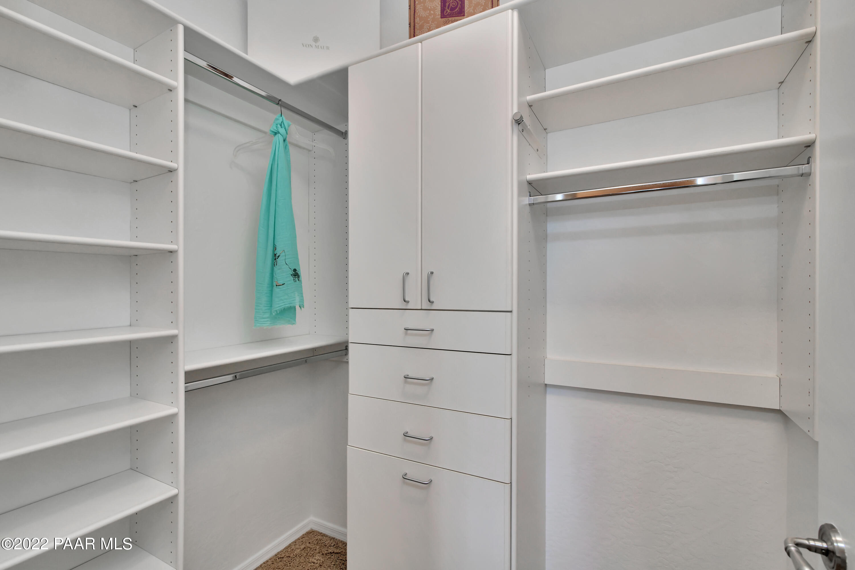 7209 Woolsey Ranch Road Prescott Valley, AZ 86314 - Photo 24 of 49 a view of walk in closet with empty racks