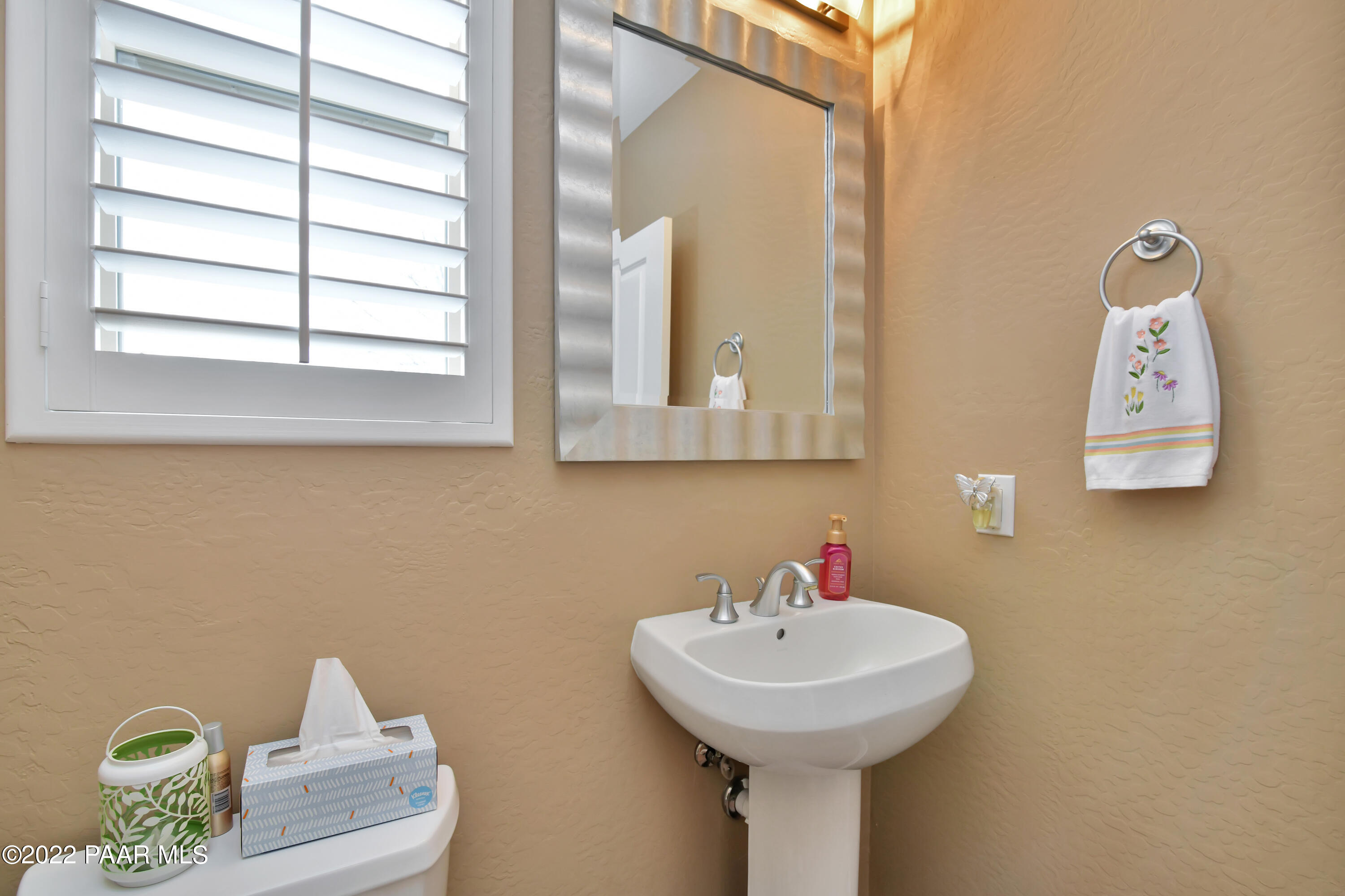 7209 Woolsey Ranch Road Prescott Valley, AZ 86314 - Photo 25 of 49 a bathroom with a sink and a mirror