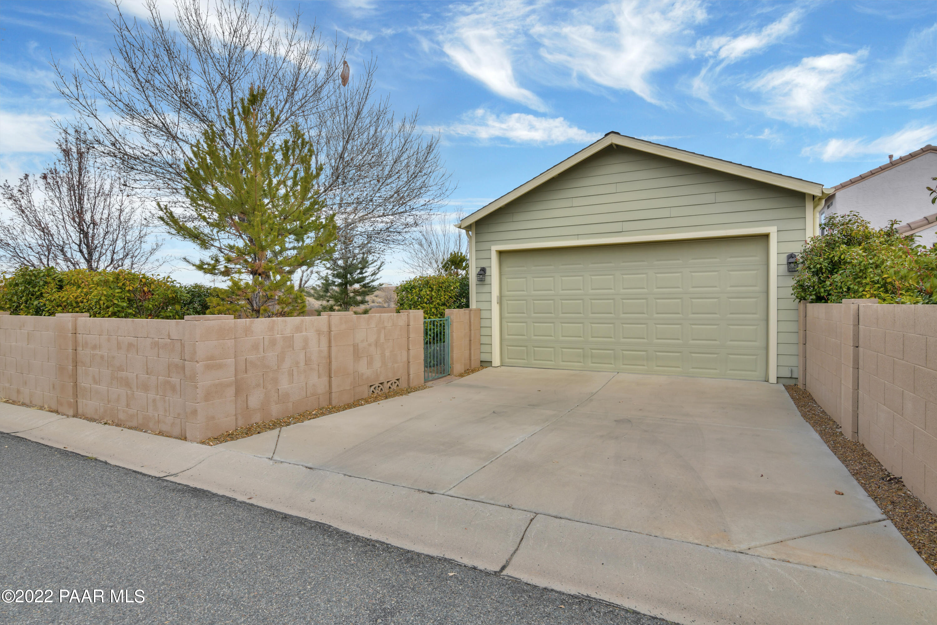 7209 Woolsey Ranch Road Prescott Valley, AZ 86314 - Photo 37 of 49 a view of backyard space and garage