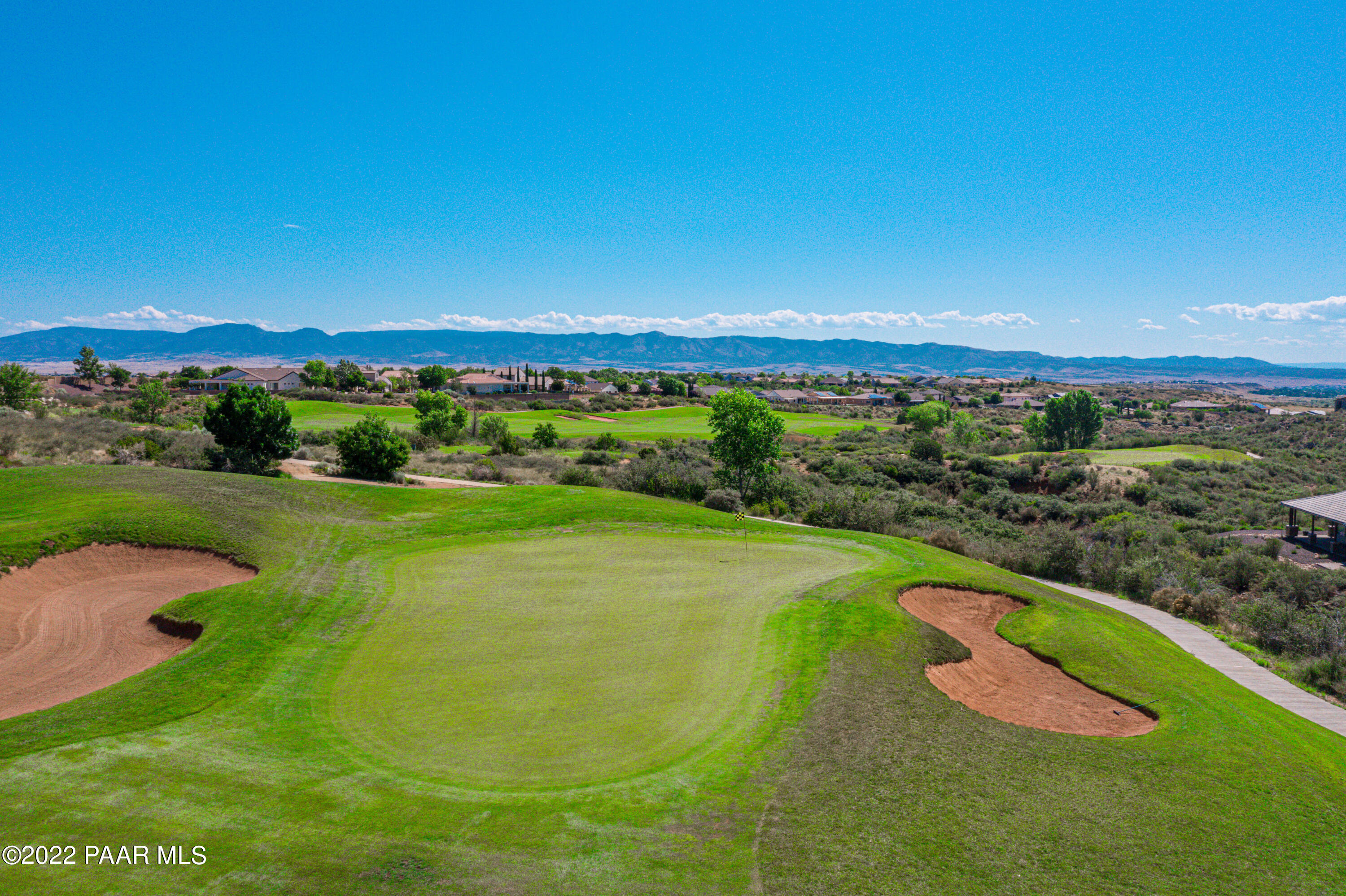 7209 Woolsey Ranch Road Prescott Valley, AZ 86314 - Photo 39 of 49 a view of a city and mountains in the background
