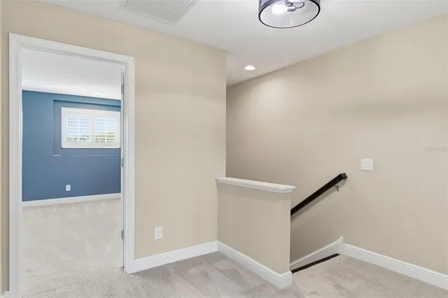 a view of a livingroom with a ceiling fan