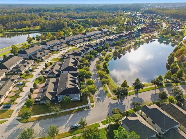 a view of swimming pool of a house with a yard