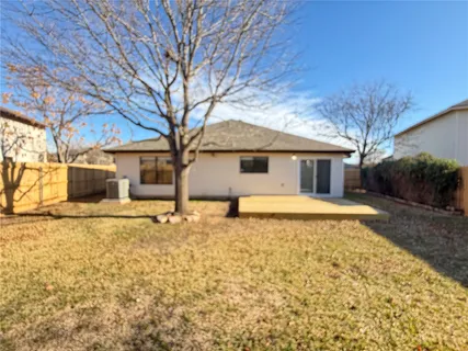 a house with trees in front of it