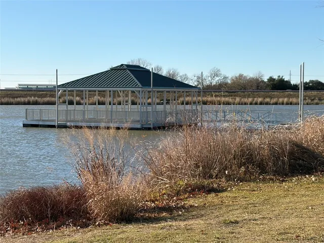 a house view with a lake view