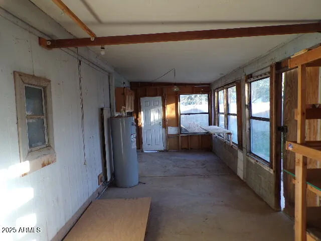 a view of a hallway with windows