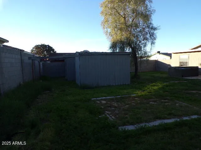 a view of garden with patio