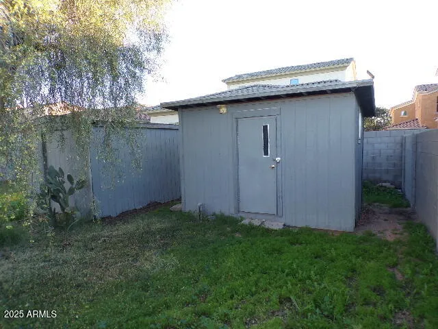 a view of a backyard with barn