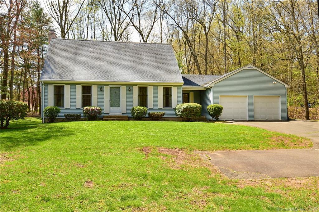 30 Hillcrest Road Bolton, CT 06043 - Photo 1 of 1 a front view of a house with garden