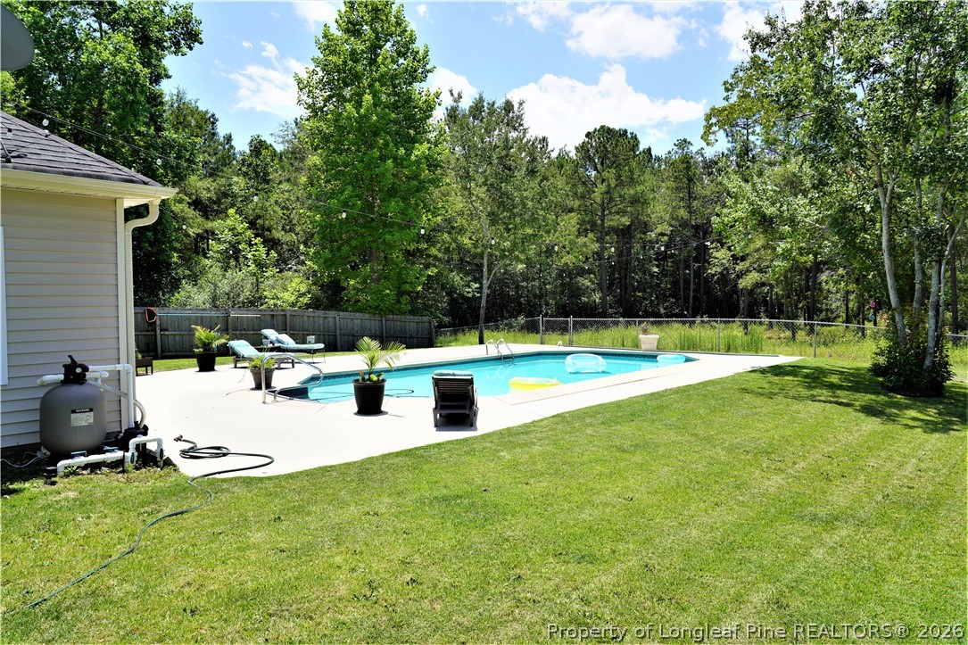 930 Old Vander Road Fayetteville, NC 28312 - Photo 39 of 45 a view of a swimming pool with a patio