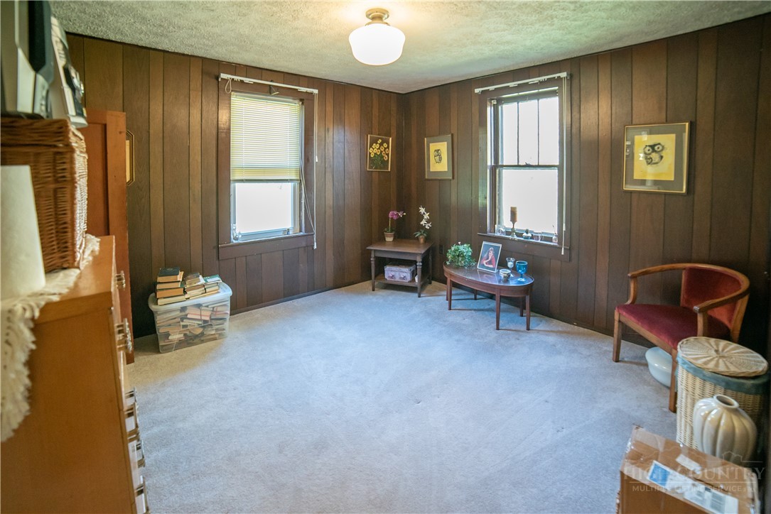 292 Little Elk Road Elk Park, NC 28622 - Photo 20 of 28 a living room with furniture and a window