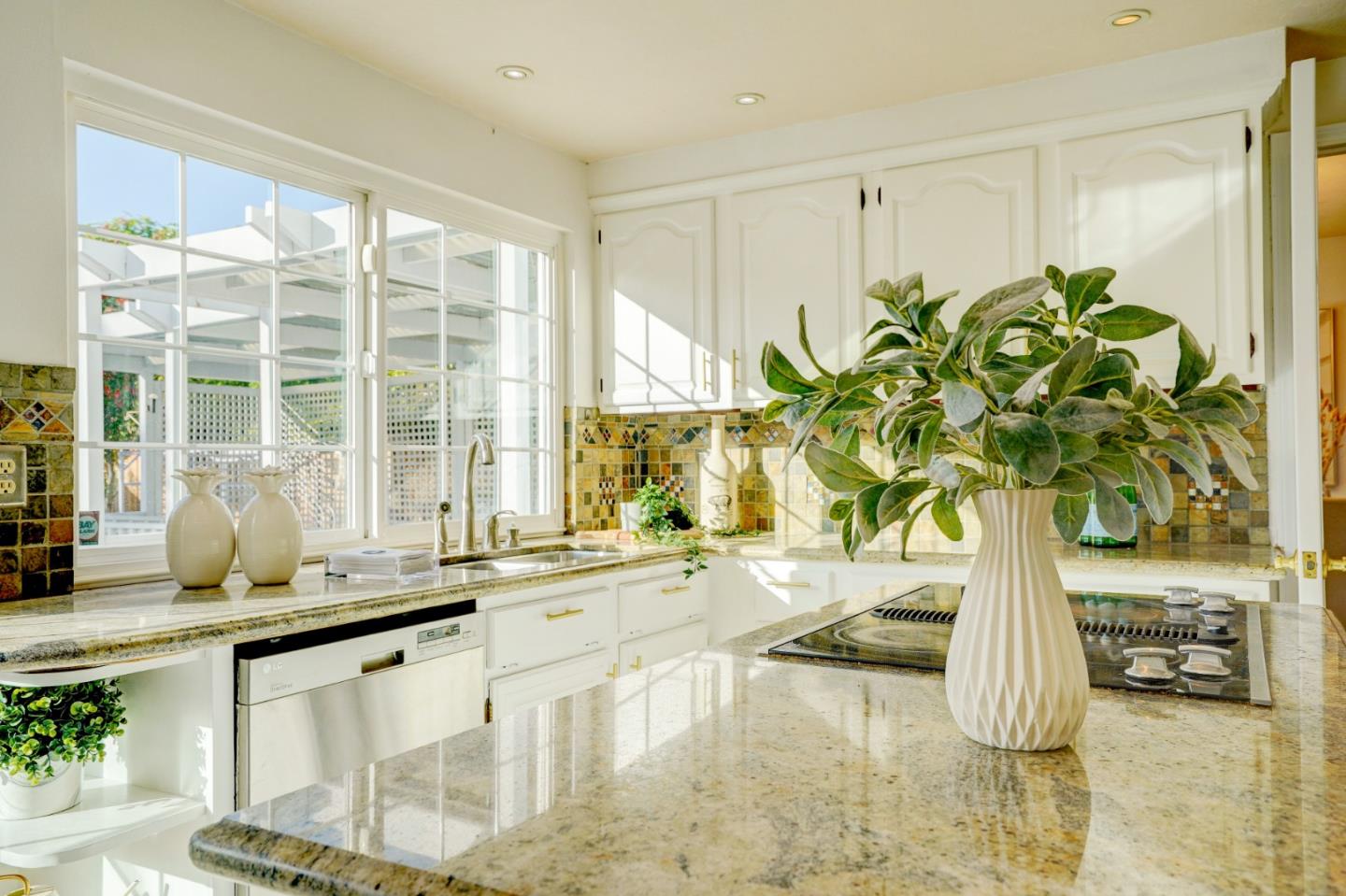 2945 Berryessa Road San Jose, CA 95132 - Photo 13 of 49 a white vase with flowers sitting on a table