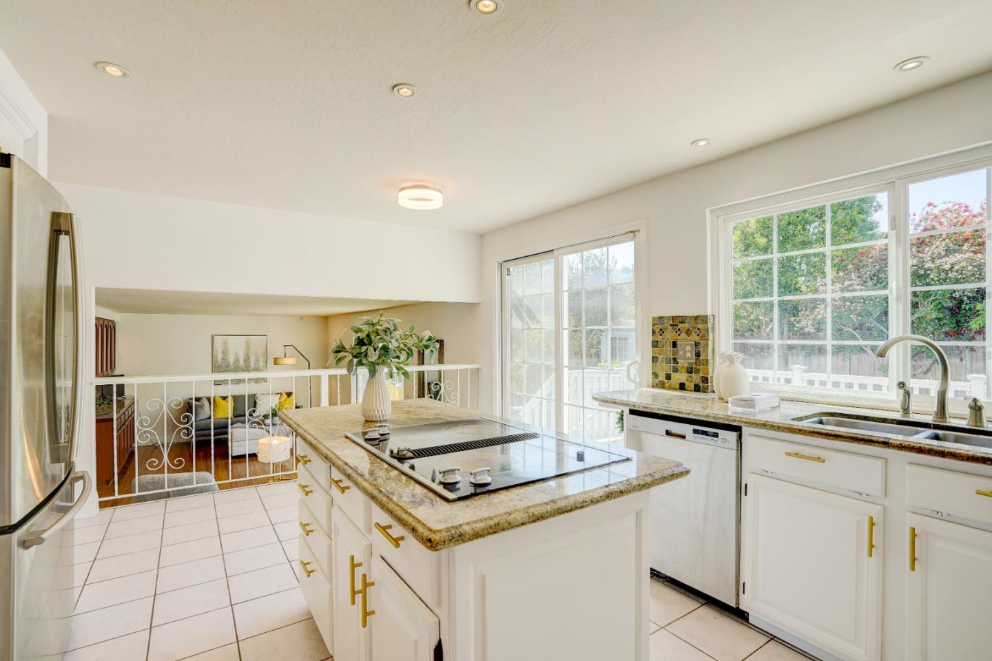 2945 Berryessa Road San Jose, CA 95132 - Photo 16 of 49 a kitchen with a sink and a stove top oven