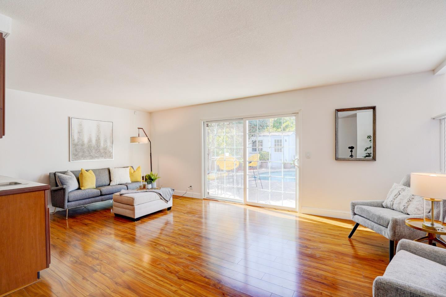 2945 Berryessa Road San Jose, CA 95132 - Photo 18 of 49 a living room with furniture and a wooden floor